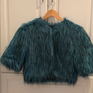 Ltd Ed teal (ovarian cancer) mid sleeve shawl.